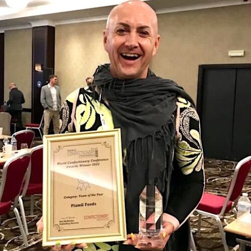 Adrain Ling of P Lamil with World Confectionery Award Square