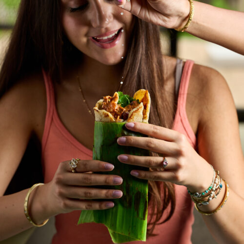Beef with roti tilly eating with lime juice drops