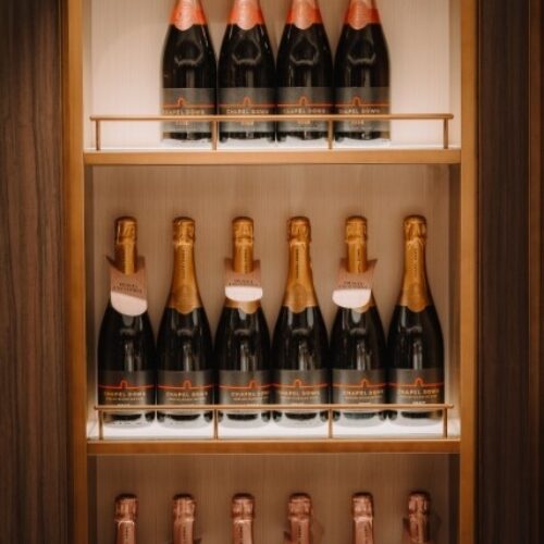 Chapel Down sparkling bottles in fridge Custom