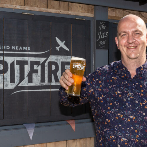 Chris Peach General Manager of The Spitfire limbers up for his world record attempt with a pint of refreshing Spitfire