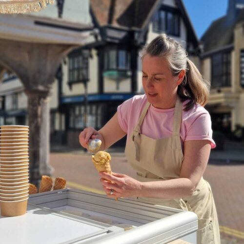 Laura from Licks and Sips serving ice cream PHOTO 2026 04 19 11 26 06 1
