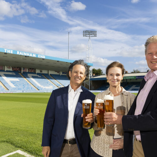 L r Gillingham FC owners Brad and Shannon Galinson with Shepherd Neames Chief Executive Jonathan Neame